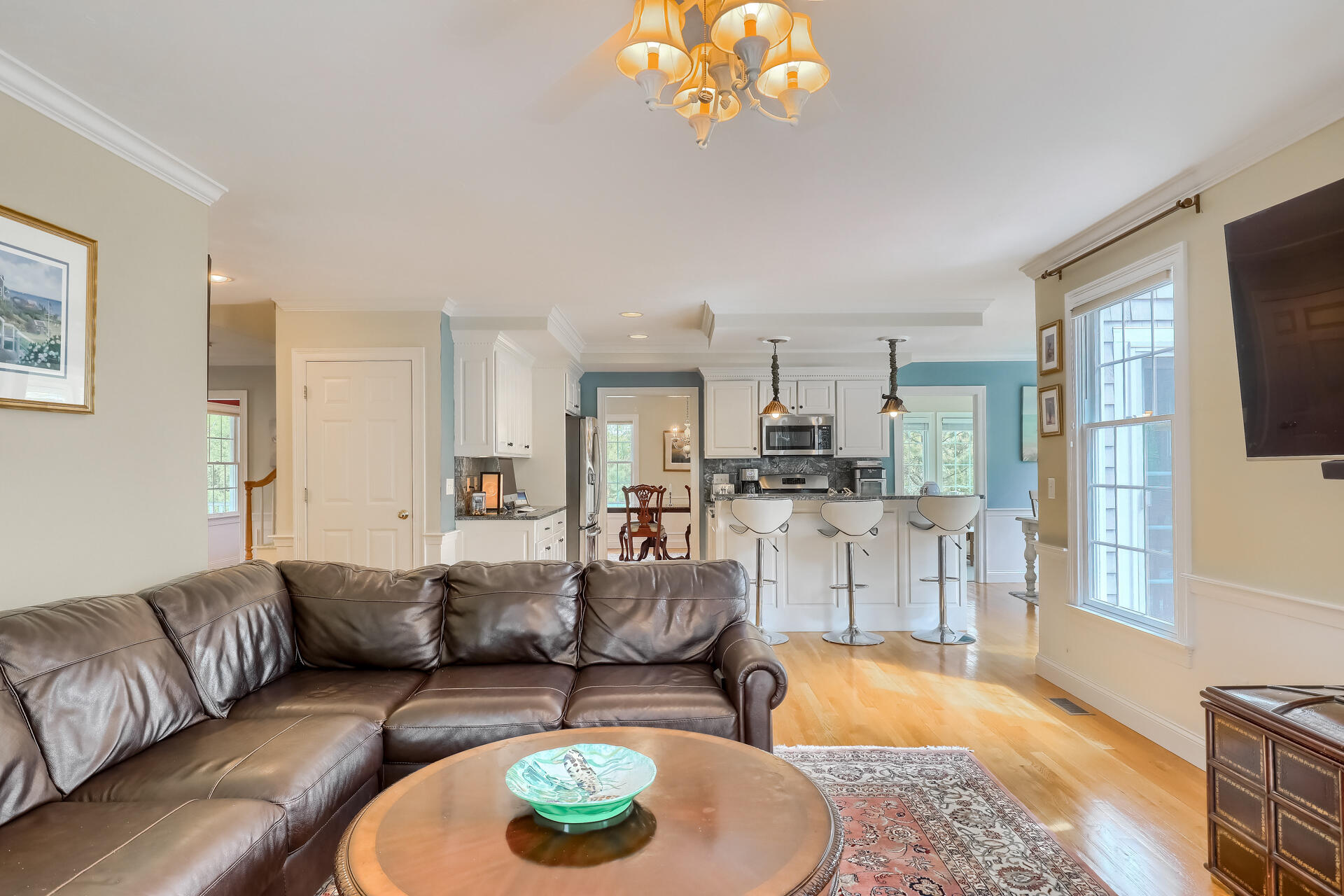 140 Great Marsh Road West Barnstable, MA 02668 - Photo 8 of 46 a living room with fireplace furniture and a flat screen tv