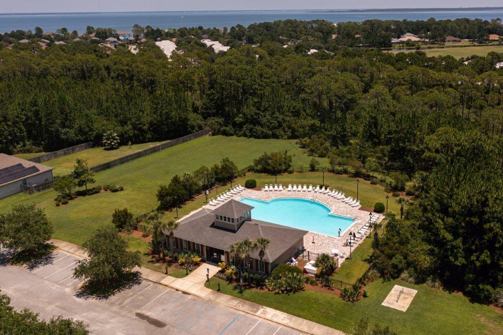 195 Pin Oak Loop Santa Rosa Beach, FL 32459 - Photo 54 of 55 an aerial view of a house with a garden