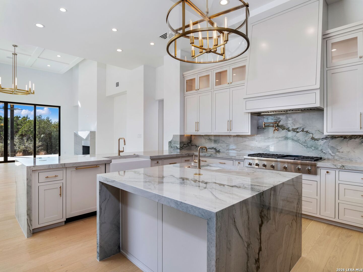 30 Paseo Rioja San Antonio, TX 78257 - Photo 20 of 70 a kitchen with a sink a stove and cabinets