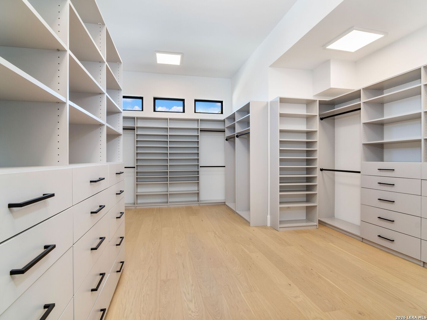 30 Paseo Rioja San Antonio, TX 78257 - Photo 33 of 70 a view of walk in closet with empty racks