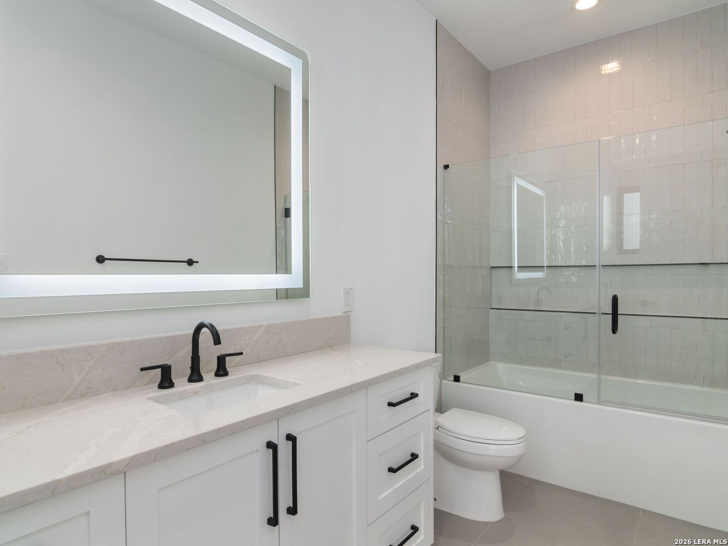 30 Paseo Rioja San Antonio, TX 78257 - Photo 47 of 70 a bathroom with a sink a toilet and shower