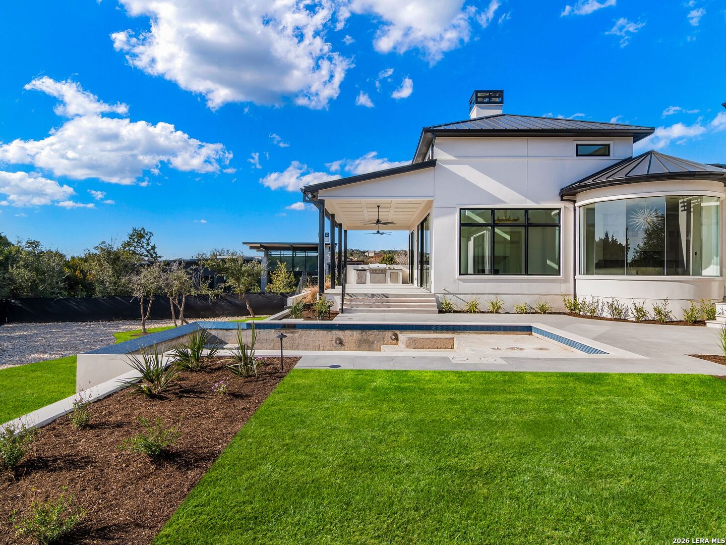 30 Paseo Rioja San Antonio, TX 78257 - Photo 53 of 70 a view of a house with a yard porch and sitting area