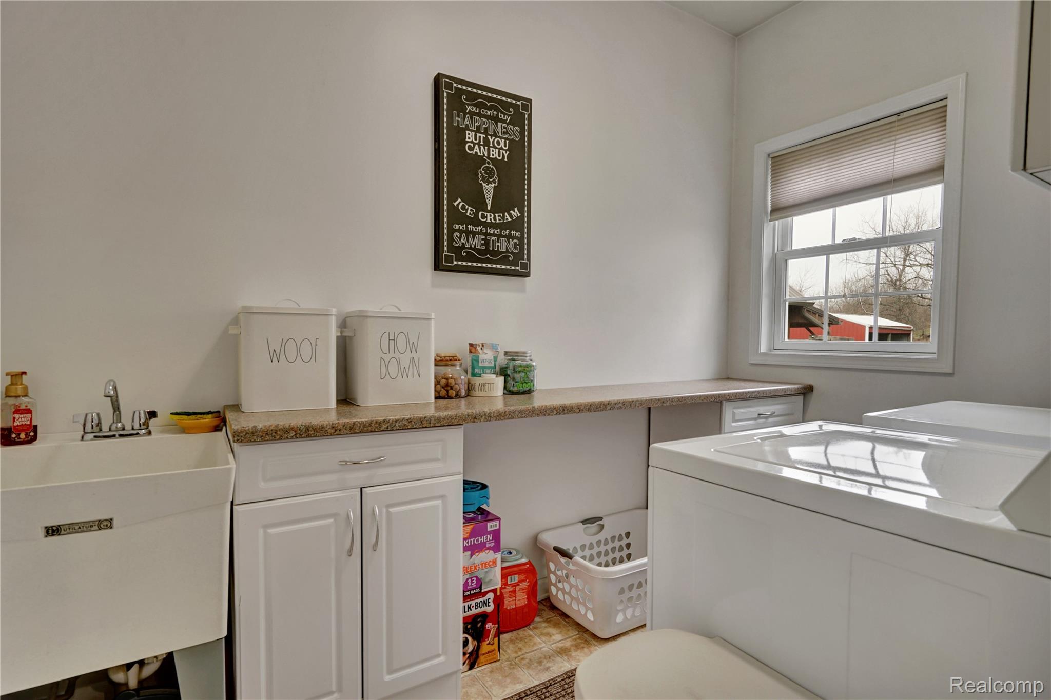 3690 Brauer Road Oxford, MI 48371 - Photo 23 of 63 Laundry room featuring a sink and washer and dryer