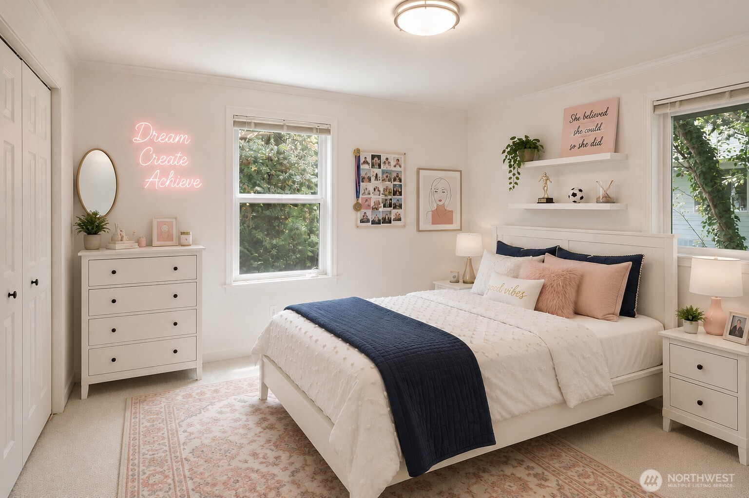 7605 Northeast Hidden Cove Road Bainbridge Island, WA 98110 - Photo 13 of 36 a bedroom with a bed and a window