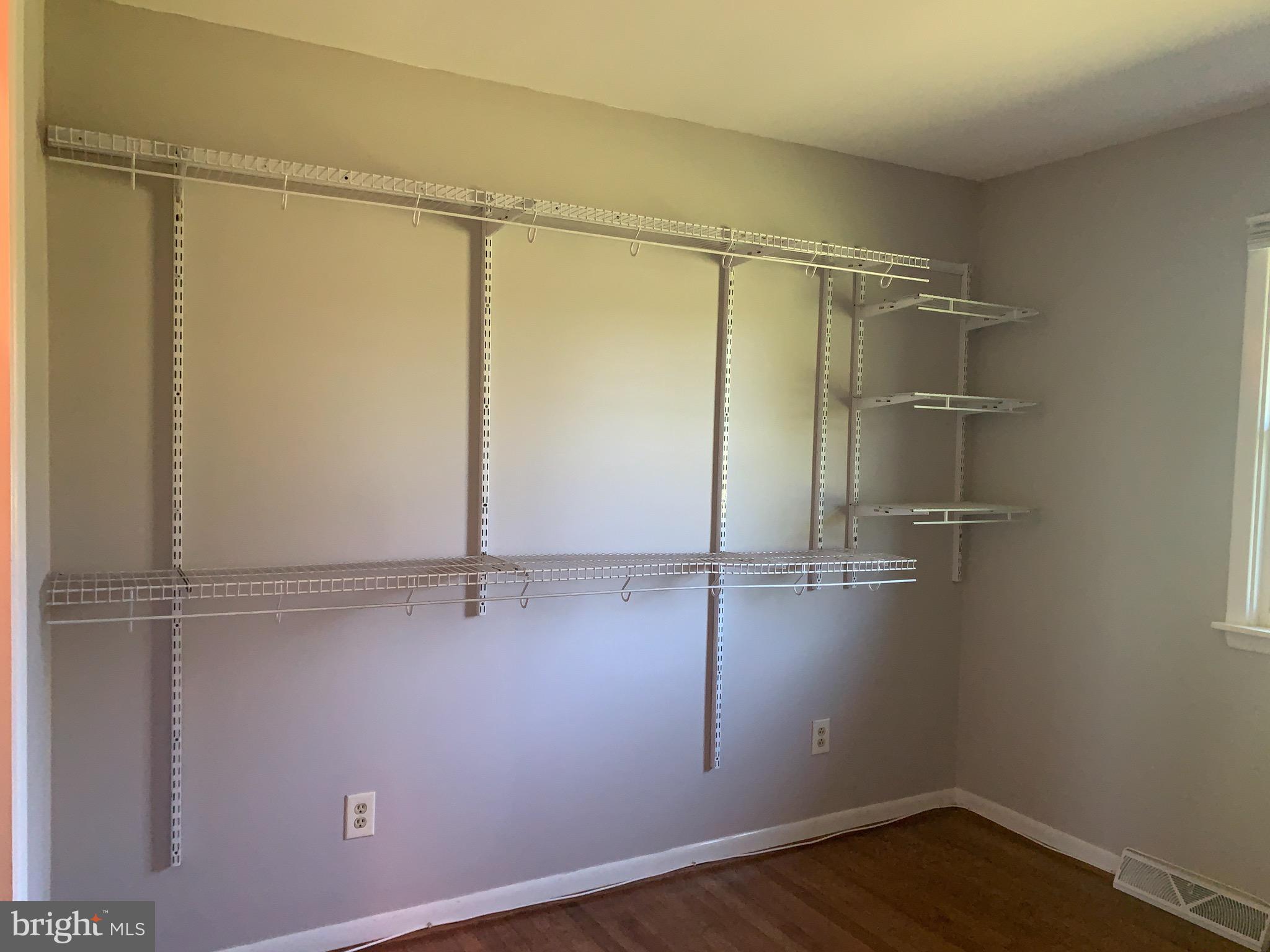 5914 Adamstown Road Adamstown, MD 21710 - Photo 11 of 13 Main Level Bedroom 3 - showing the shelving