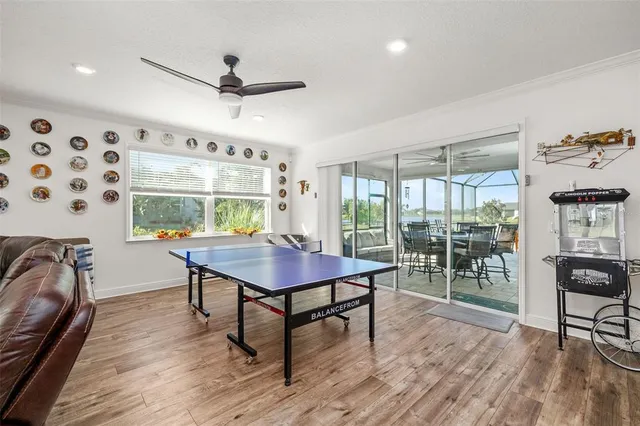 a view of a backyard with sitting area