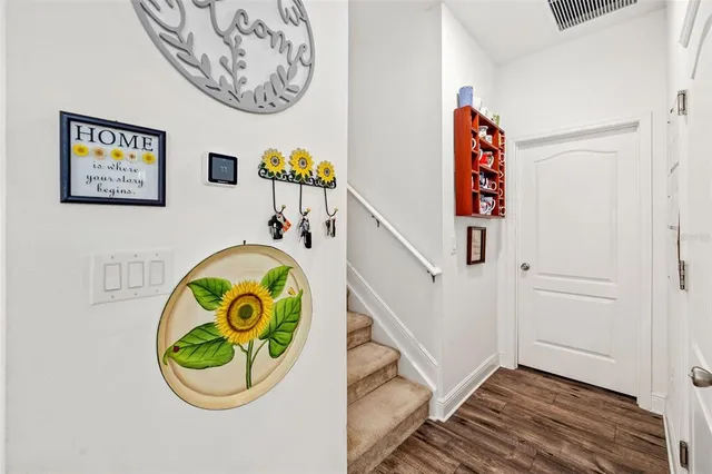 a bathroom with double vanity sinks a mirror and a shower