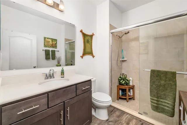 an aerial view of a house with a swimming pool yard and outdoor seating