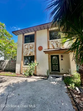 a front view of house with yard