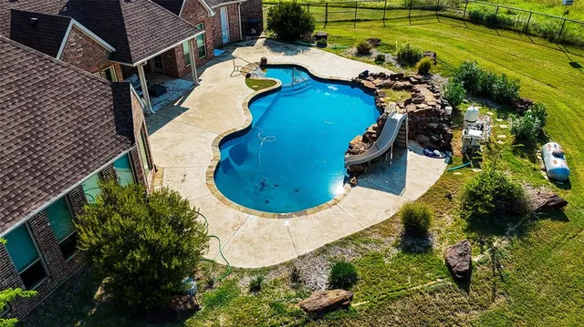 an aerial view of a house having outdoor space