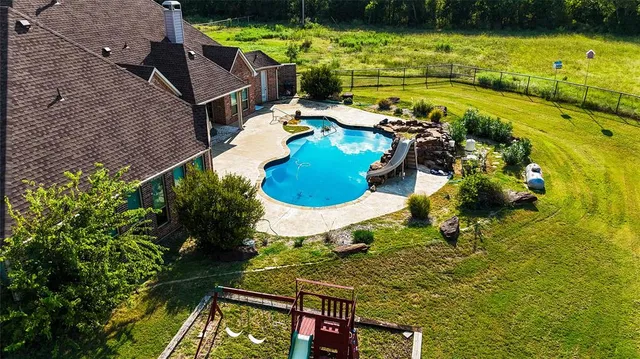 a view of an outdoor space and swimming pool
