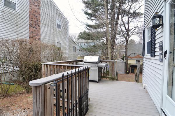 39 Summit Road Holbrook, MA 02343 - Photo 20 of 21 a view of a deck with couches and wooden fence