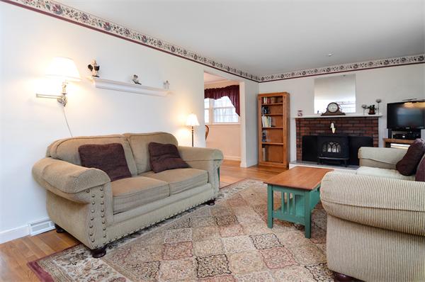 39 Summit Road Holbrook, MA 02343 - Photo 2 of 21 a living room with furniture and a flat screen tv