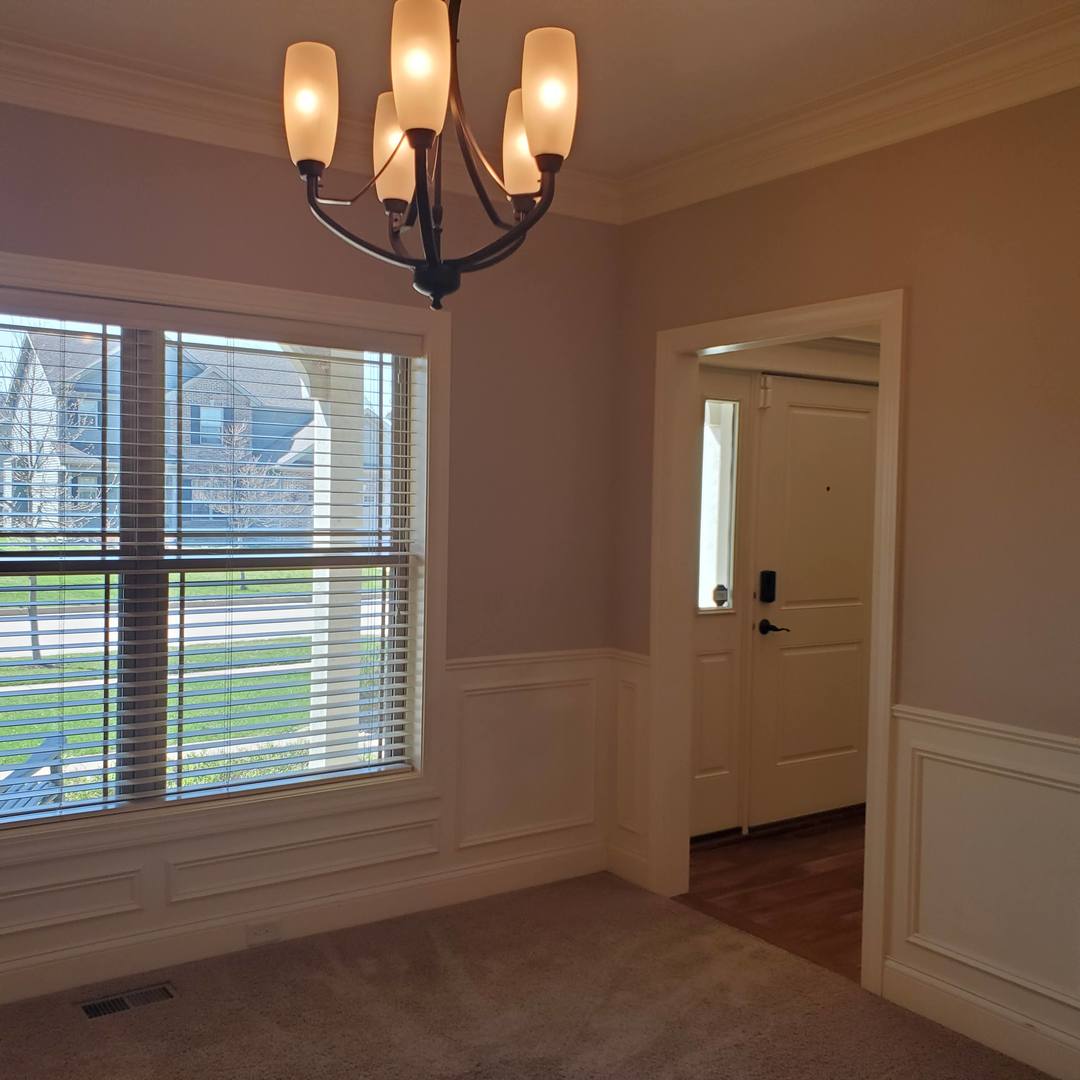 2008 Savanna Drive Champaign, IL 61822 - Photo 24 of 62 an empty room with wooden floor and windows