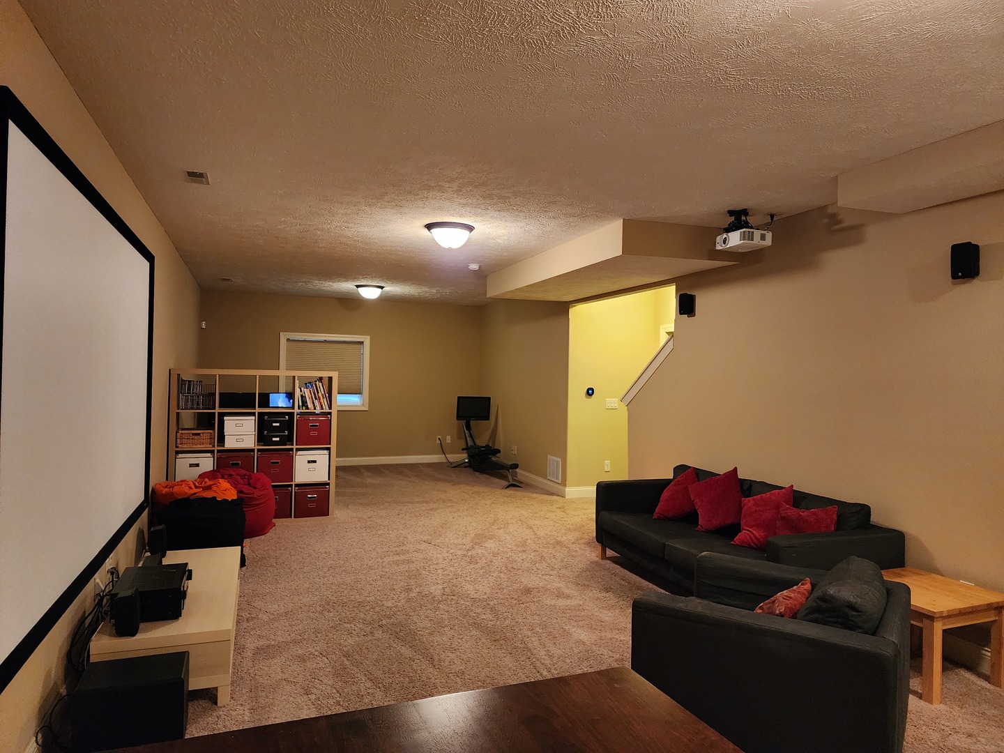2008 Savanna Drive Champaign, IL 61822 - Photo 45 of 62 a living room with furniture gym equipment and a flat screen tv