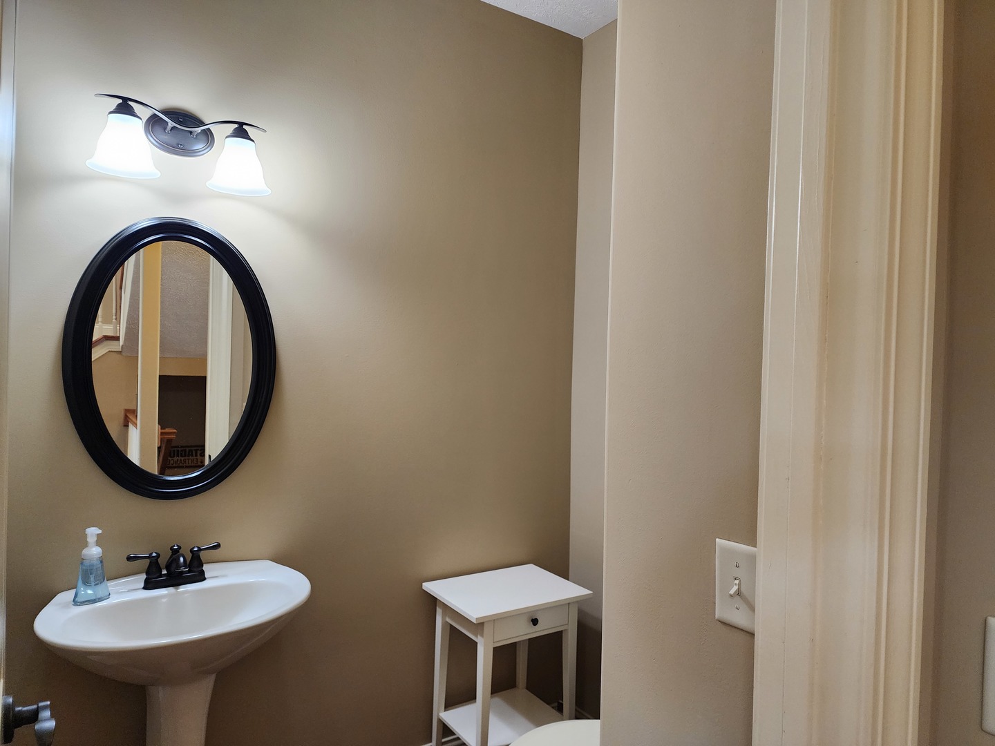 2008 Savanna Drive Champaign, IL 61822 - Photo 7 of 62 a bathroom with a sink and a mirror