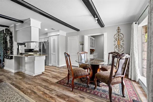 a view of a dining room with furniture