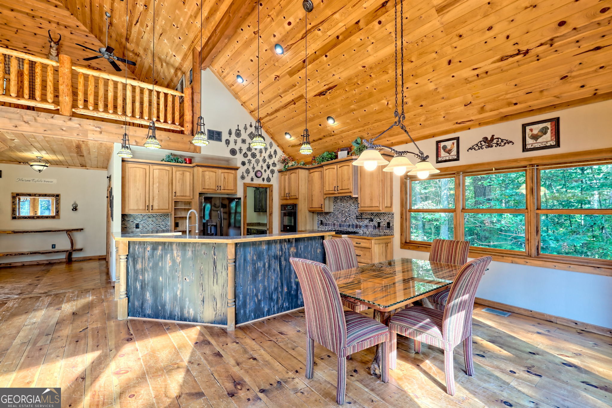 199 Camelia Lane Tiger, GA 30576 - Photo 18 of 100 a view of a patio with a table and chairs