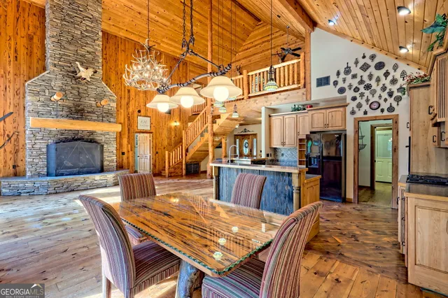 a bathroom with a granite countertop sink and washing machine