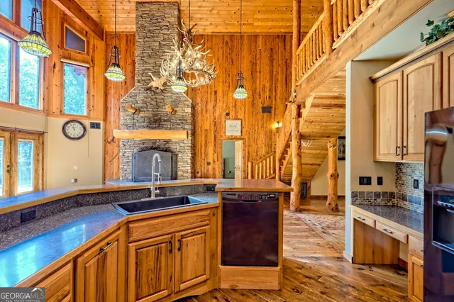 a view of a patio with a table and chairs