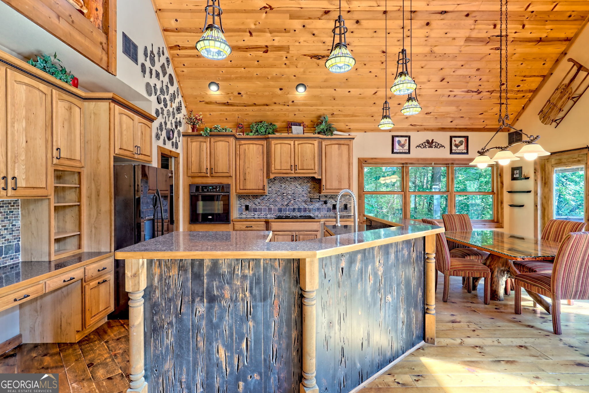 199 Camelia Lane Tiger, GA 30576 - Photo 27 of 100 a view of a chairs and table in a patio