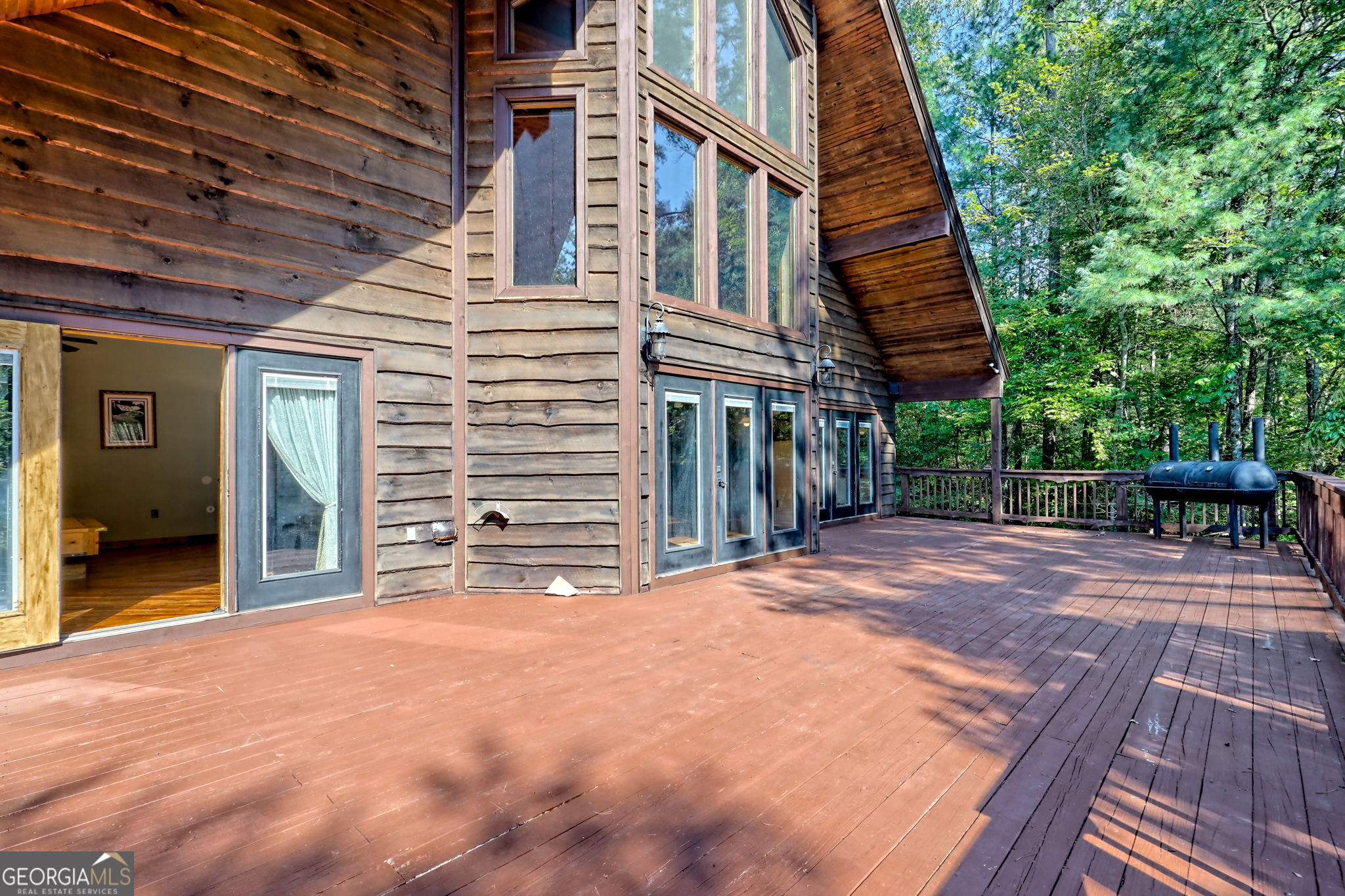 199 Camelia Lane Tiger, GA 30576 - Photo 31 of 100 a view of a house with a barbeque