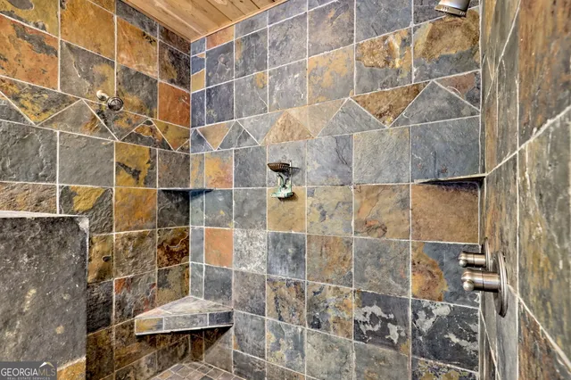 a view of a porch with wooden floor and roof