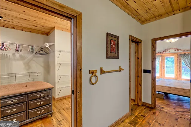 a view of backyard with swimming pool and porch