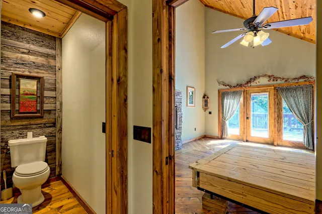 a backyard of a house with a yard with outdoor seating