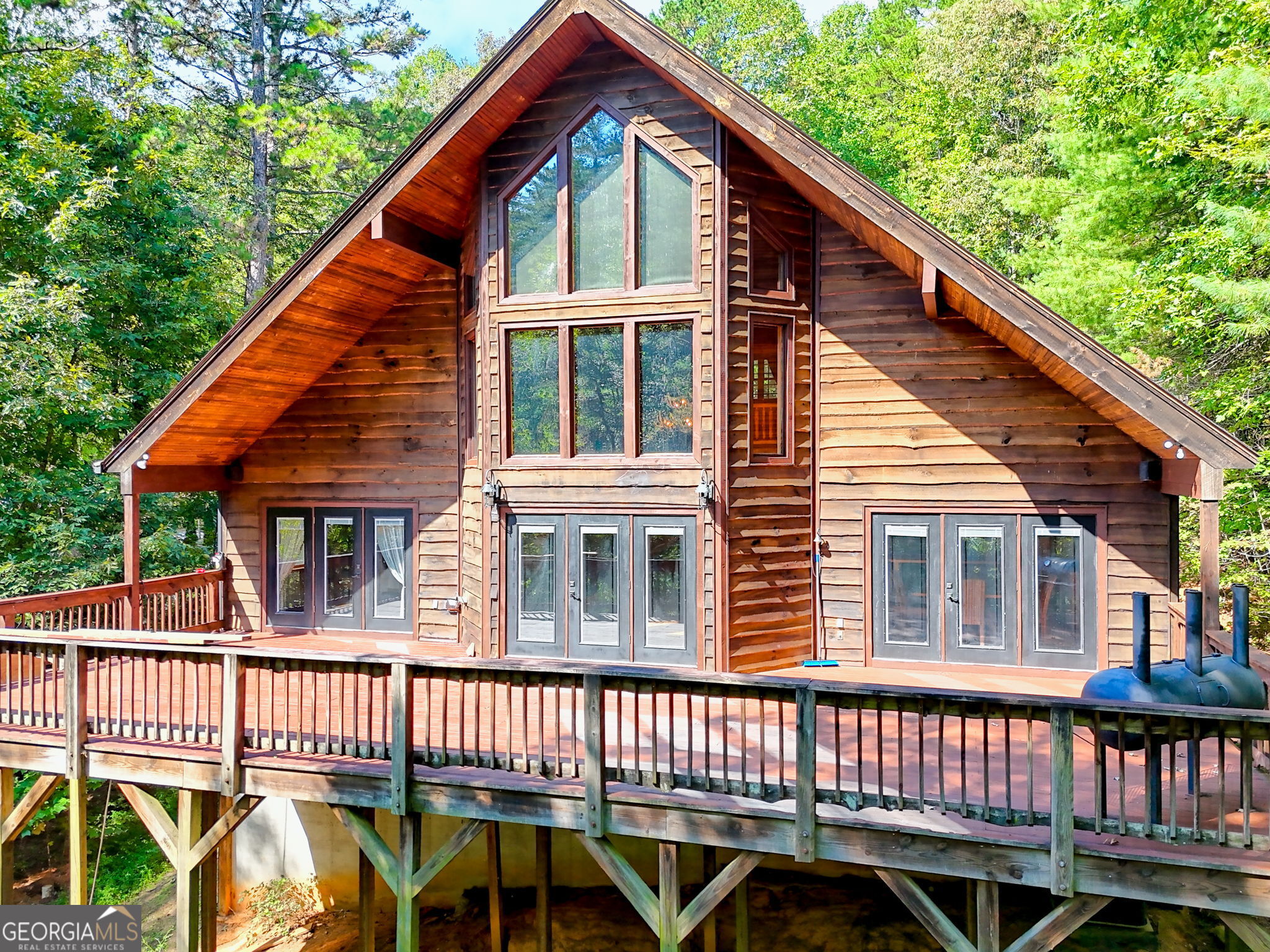 199 Camelia Lane Tiger, GA 30576 - Photo 6 of 100 a view of a house with a deck