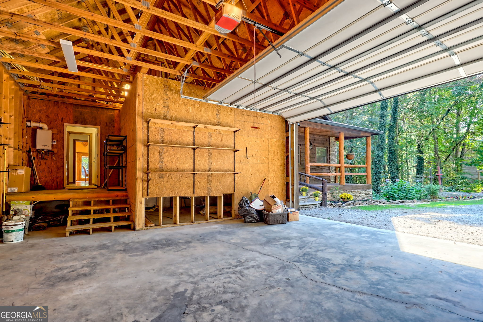 199 Camelia Lane Tiger, GA 30576 - Photo 66 of 100 a view of a house with backyard porch and seating space