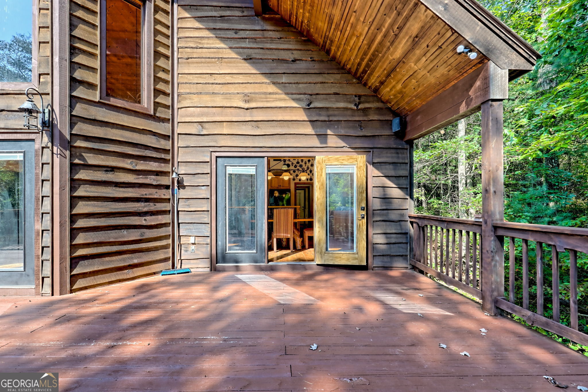 199 Camelia Lane Tiger, GA 30576 - Photo 78 of 100 a view of a porch with wooden floor and roof
