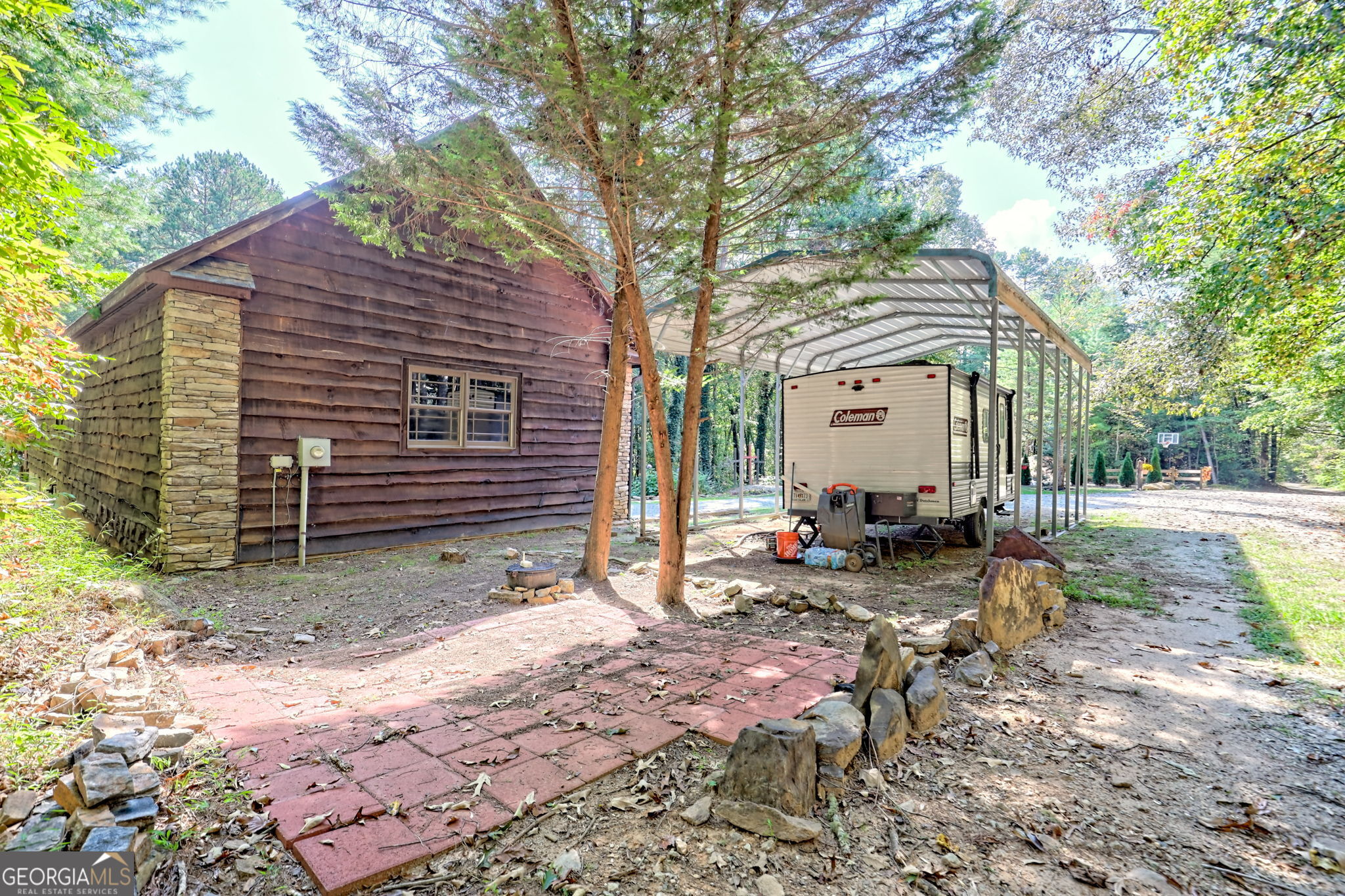 199 Camelia Lane Tiger, GA 30576 - Photo 82 of 100 a view of a house with backyard and sitting area