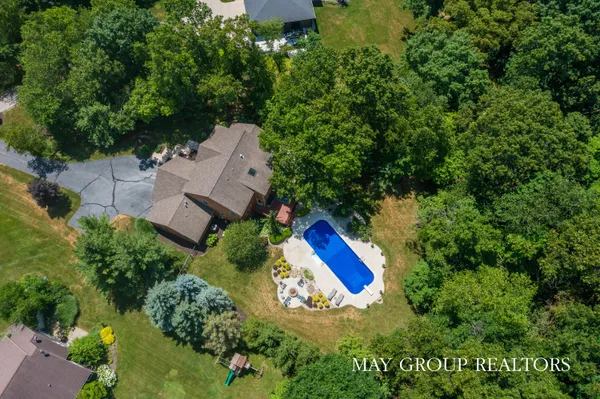 $1,200,000 | 5254 Canyon River Drive Northeast, Ada, MI 49301