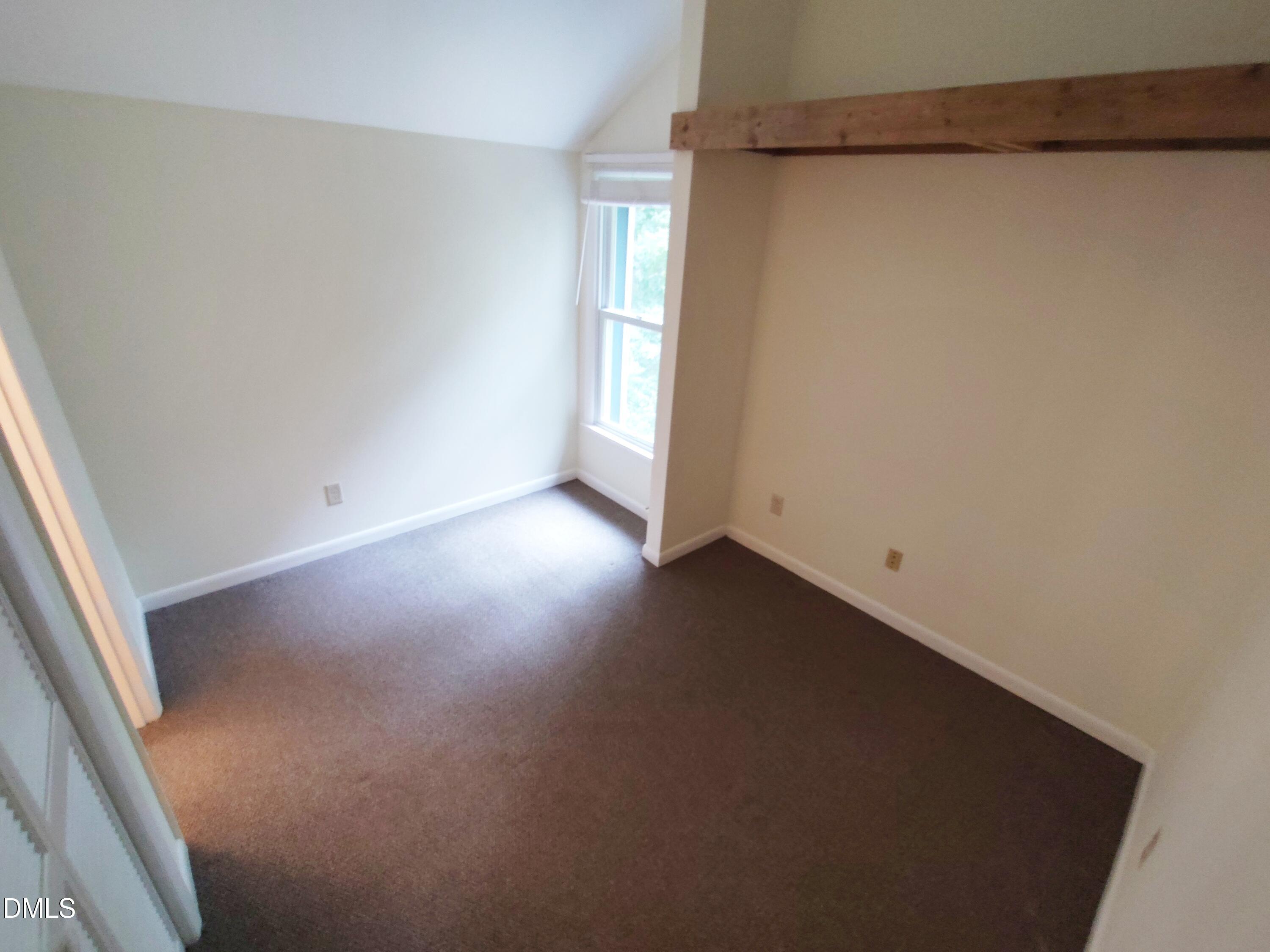1321 Valley Run Durham, NC 27707 - Photo 16 of 19 a view of a small space with wooden floor and a window