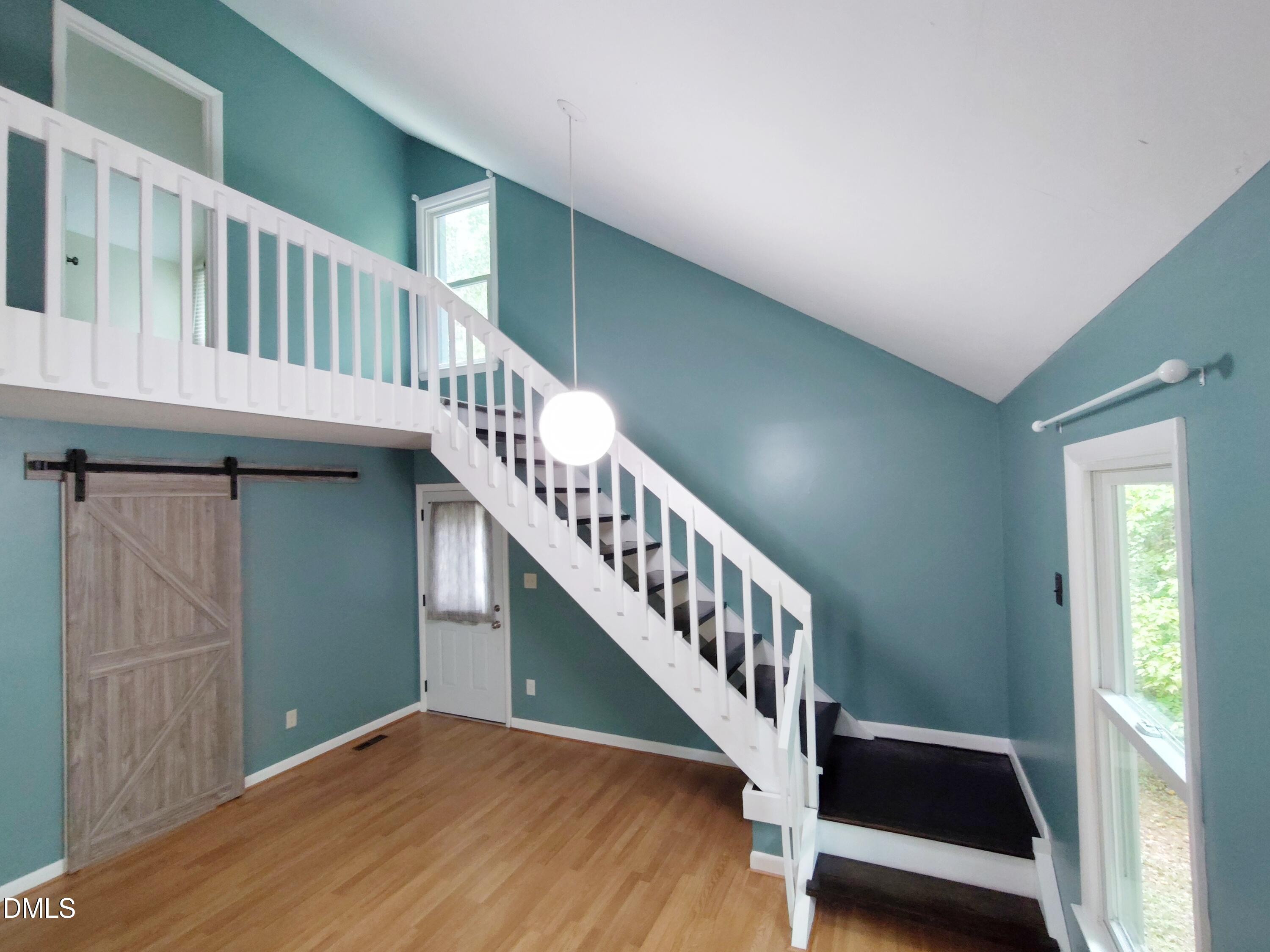 1321 Valley Run Durham, NC 27707 - Photo 4 of 19 a view of entryway with wooden floor
