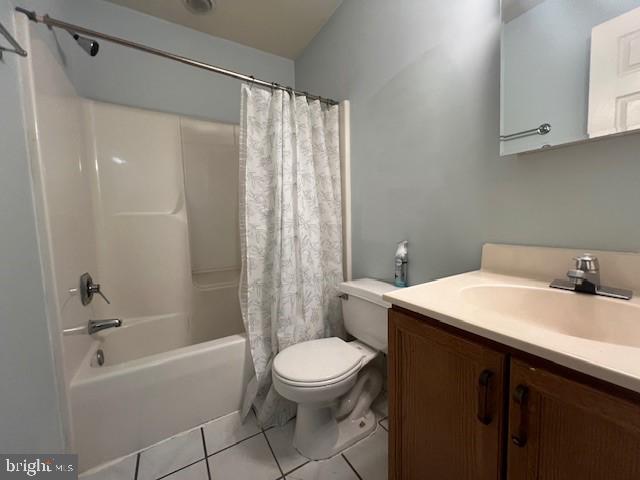 309 East 3rd Street, Unit B Frederick, MD 21701 - Photo 14 of 15 a bathroom with a sink a toilet and shower