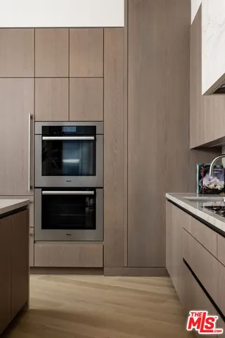 a kitchen with a stove and a microwave