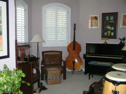 6 Ridgeview Road North Stuart, FL 34996 - Photo 8 of 8 a living room with furniture and a fireplace