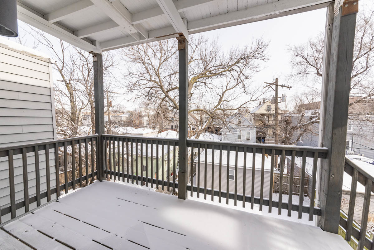 2825 North Rockwell Street, Unit 2 Chicago, IL 60618 - Photo 19 of 22 a view of a two chairs in the balcony