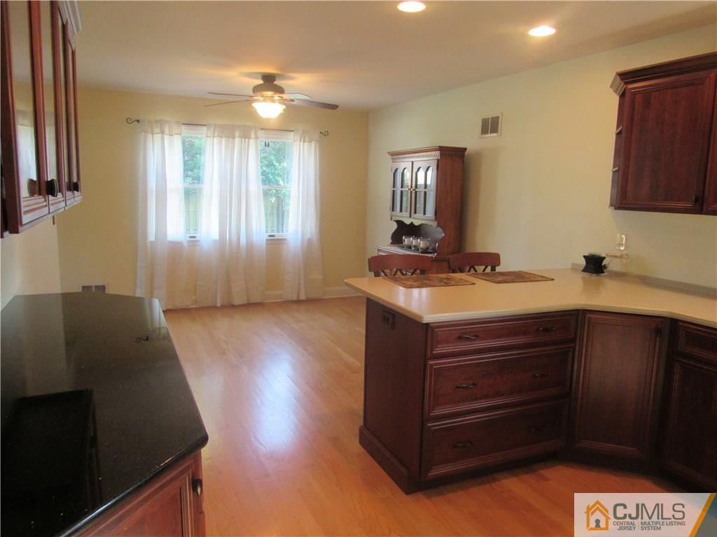 3 Hillsdale Road Edison, NJ 08820 - Photo 8 of 27 a kitchen with a sink a stove and a window