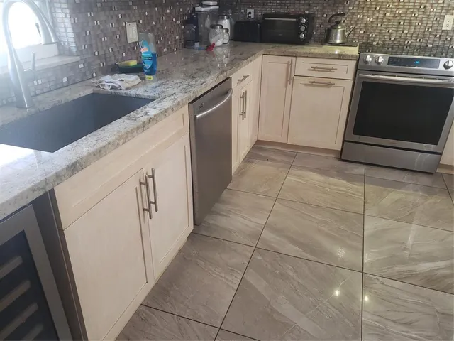 a bathroom with a sink a vanity and a mirror