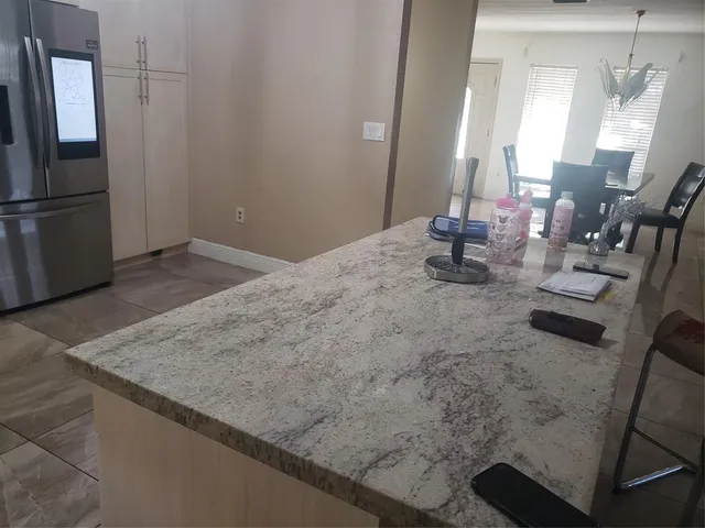 a view of a swimming pool with a yard