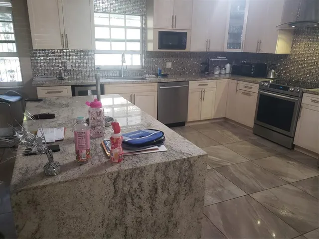 a swimming pool with a yard