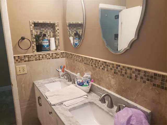 a view of balcony with wooden floor