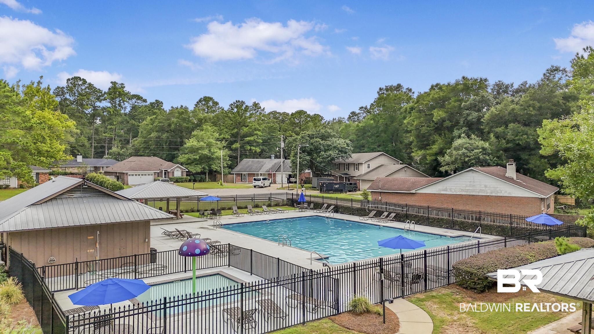 140 Hope Drive Daphne, AL 36526 - Photo 49 of 54 Community pool featuring a residential view and a patio