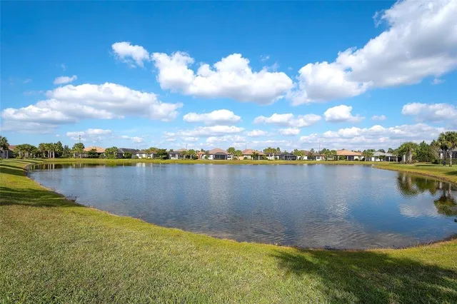 an aerial view of houses with outdoor space