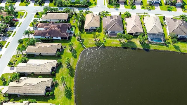 a view of a house with backyard and porch