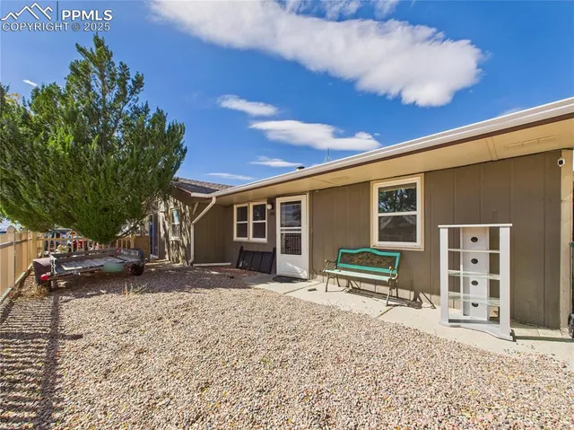 a front view of a house with a patio