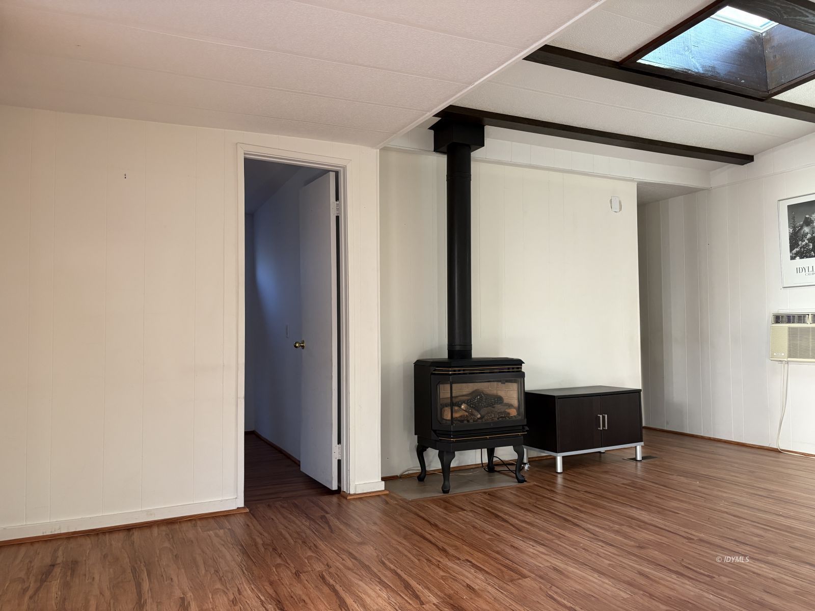 25955 Highway 243, Unit 25 Idyllwild, CA 92549 - Photo 17 of 38 an empty room with wooden floor and furniture